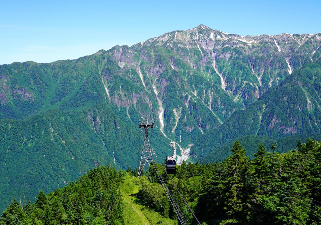 筋肉と自然と遊ぶ宿 田島館 Hotel Такаяма Екстериор снимка